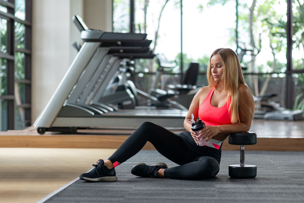 Female athlete relaxing after workout