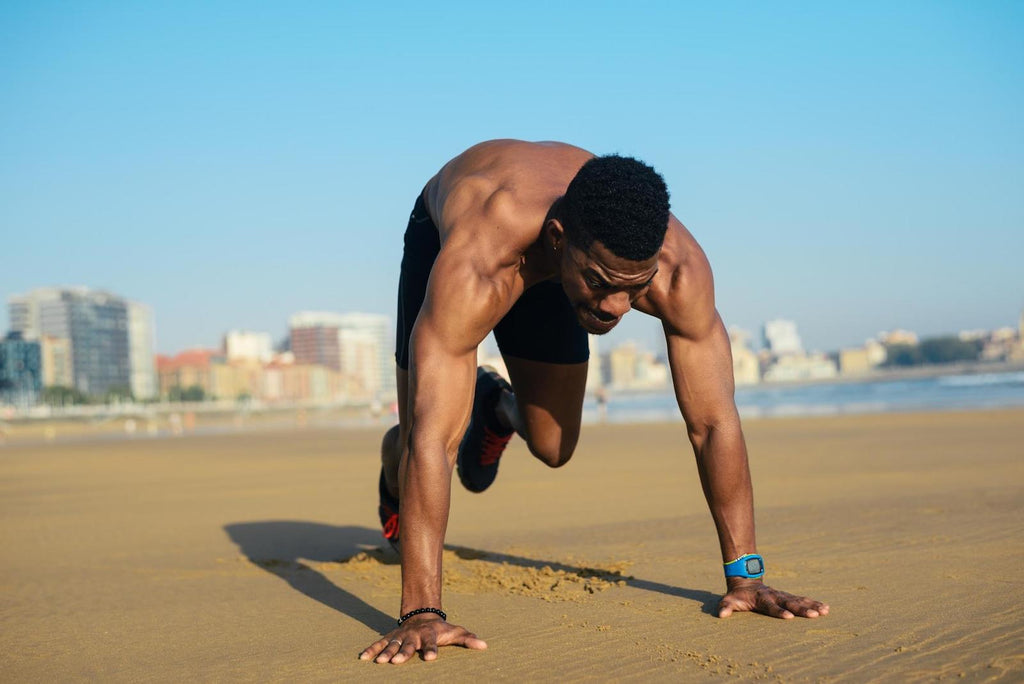 Man doing mountain climbers exercise